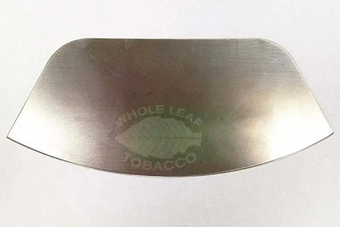 A reflective, curved stainless steel chaveta.